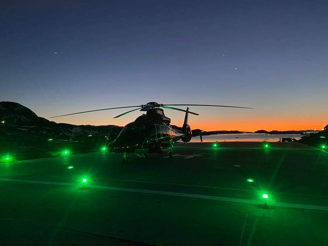 H155 helikopter på heliporten i Siorapaluk i december 2022. Foto: Martin Nørregaard