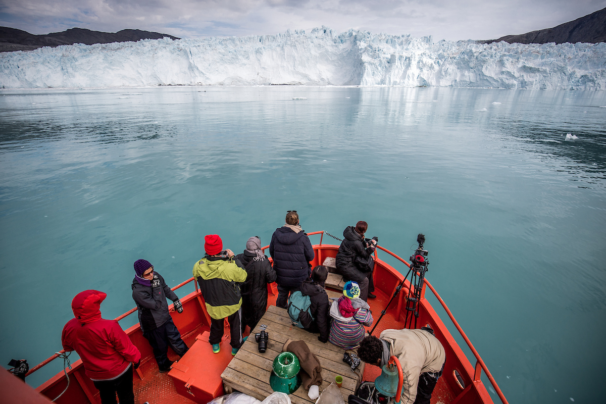 A Passenger Boat Near The Eqi Glacier In Greenland