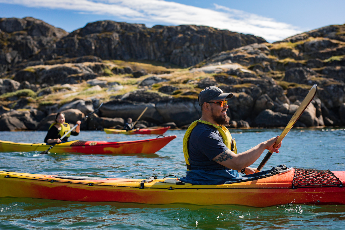 Group Of Kayakers On Tour Neat Sisimiut. Photo Aningaaq R. Carlsen, Visit Greenland