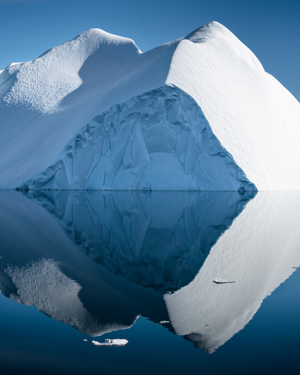 An Iceberg Mirorring In The Perfectly Still Waters Of The Disko Bay. Photo By Alex Savu Visit Greenland