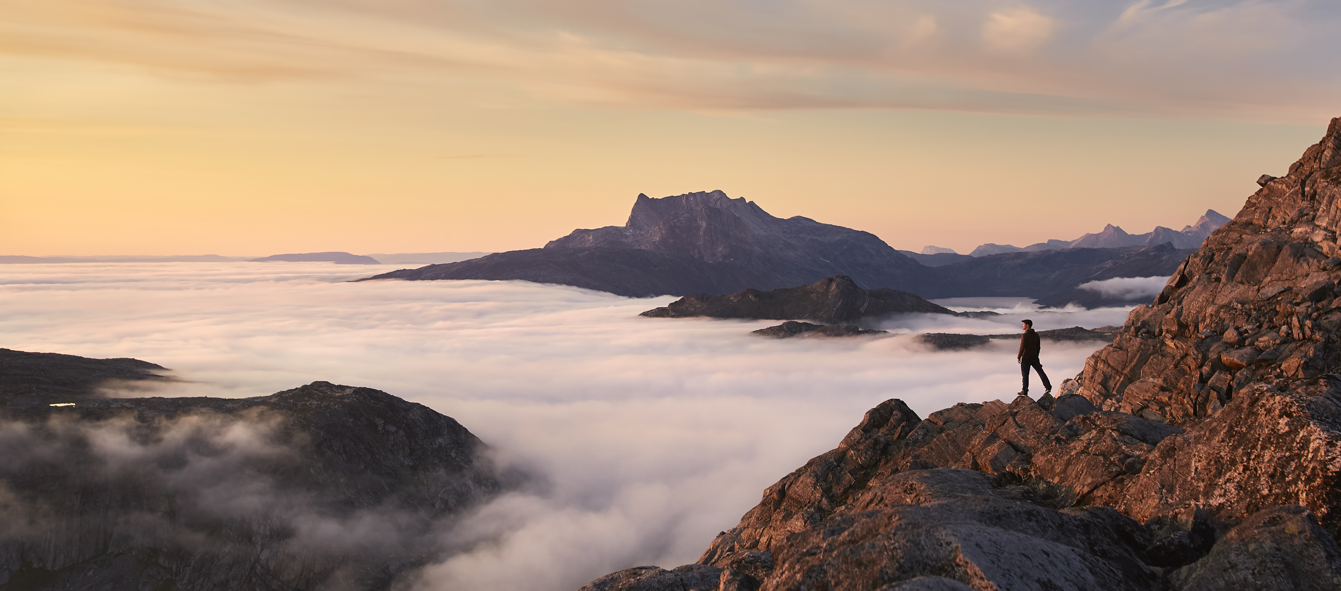 Hiker At Store Malene Peak, Nuuk. Photo Peter Lindstrom , Visit Greenland